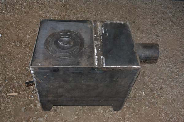 Самодельная буржуйка с варочной плитой (18 фото + описание) Самодельная буржуйка с варочной плитой (18 фото + описание)