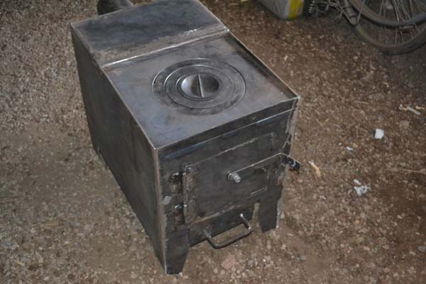 Самодельная буржуйка с варочной плитой (18 фото + описание) Самодельная буржуйка с варочной плитой (18 фото + описание)