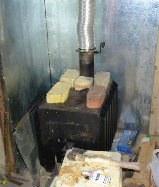 Самодельная буржуйка с варочной плитой (18 фото + описание) Самодельная буржуйка с варочной плитой (18 фото + описание)