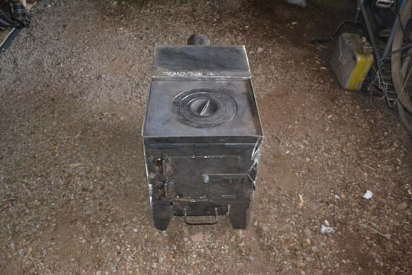 Самодельная буржуйка с варочной плитой (18 фото + описание) Самодельная буржуйка с варочной плитой (18 фото + описание)