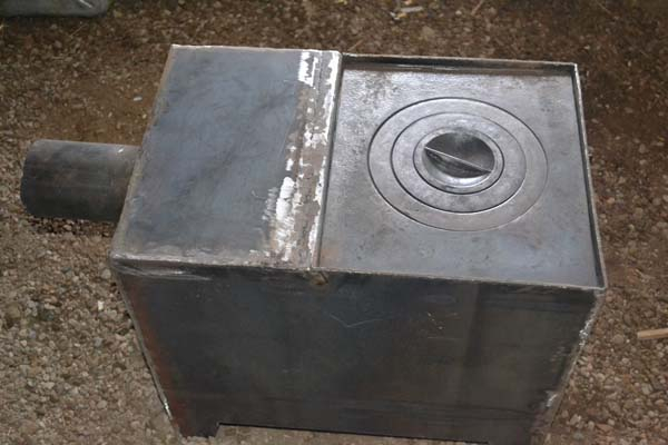 Самодельная буржуйка с варочной плитой (18 фото + описание) Самодельная буржуйка с варочной плитой (18 фото + описание)